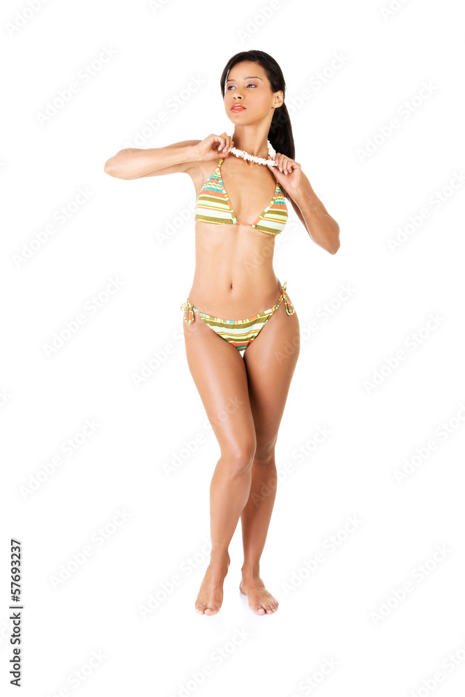 Naklejka premium Portrait of dark skinned girl in bikini