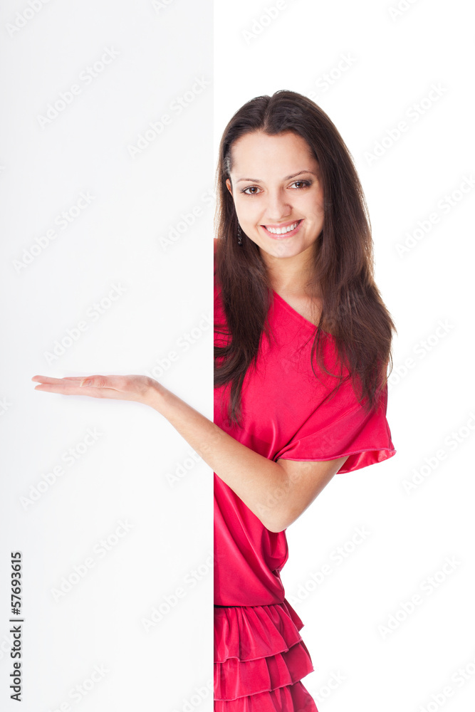 Young smiling woman showing blank signboard Young smiling woman showing blank signboard