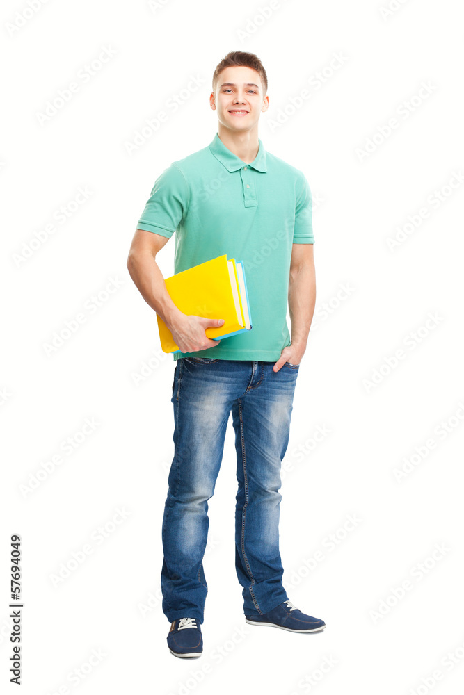Full length portrait of happy smiling student with his notebook Full length portrait of happy smiling student with his notebook