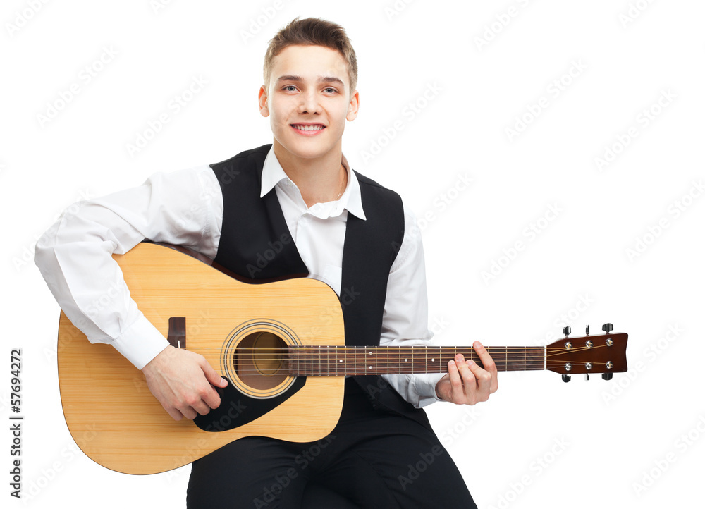 Obraz premium Young man playing on guitar