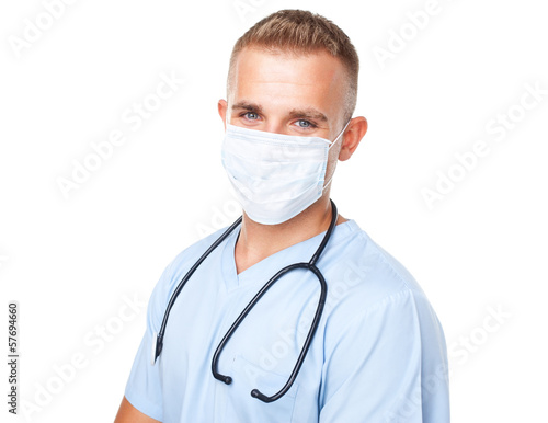 Portrait of young medical doctor in mask