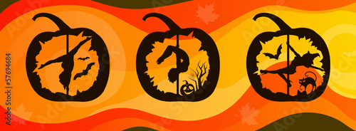 Silhouettes of pole dancers carved in Halloween pumpkin