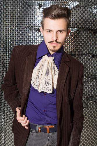 Fotografie man with mustache in fashionable dress with lace tie