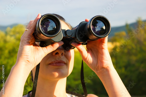 Woman with binoculars