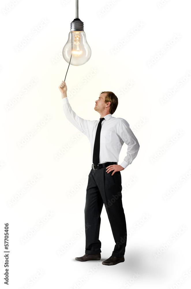 Fototapeta premium Businessmann macht das Licht an