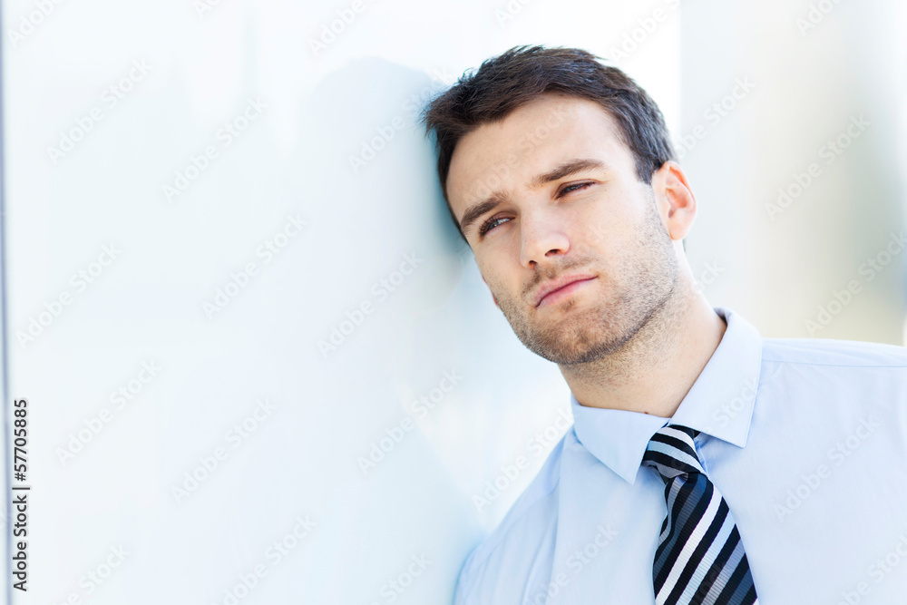 Pensive business man Pensive business man