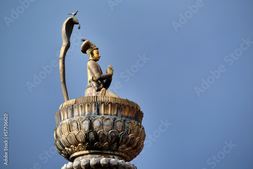 King Yoganarendra Malla bronze statue on a column. Nepal photo