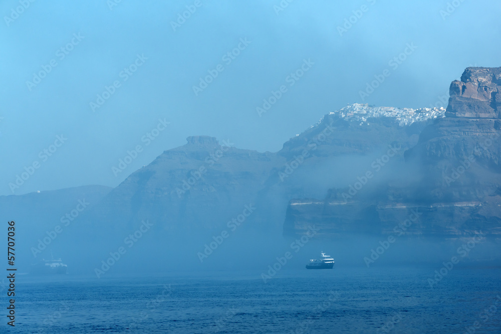 Panorama of Santorini island and Fira city from the Aegean sea, Greece