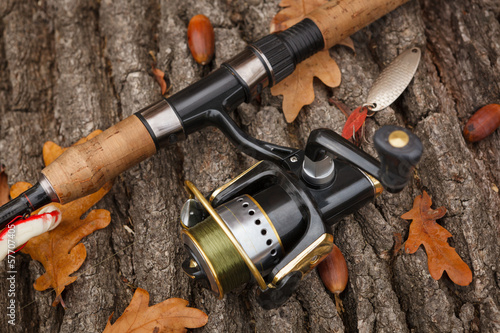 Fishing tackle on wooden surface.