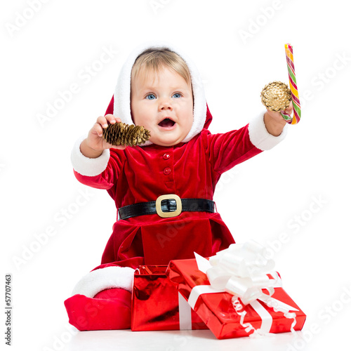 happy baby in Santa Claus c...