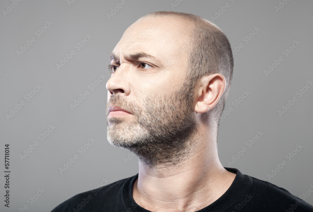 man look into the distance isolated on gray background man look into the distance isolated on gray background