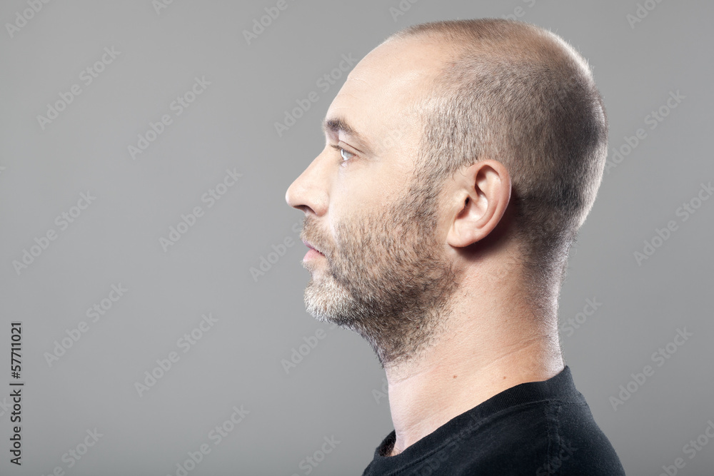 profile portrait of man isolated on gray background with copyspa profile portrait of man isolated on gray background with copyspa