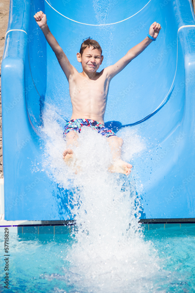 Fototapeta premium Boy on a water slide
