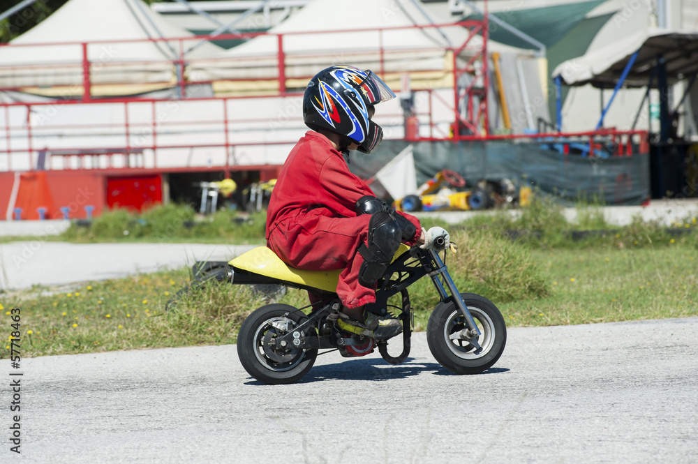 Fototapeta premium Young driver on minibike