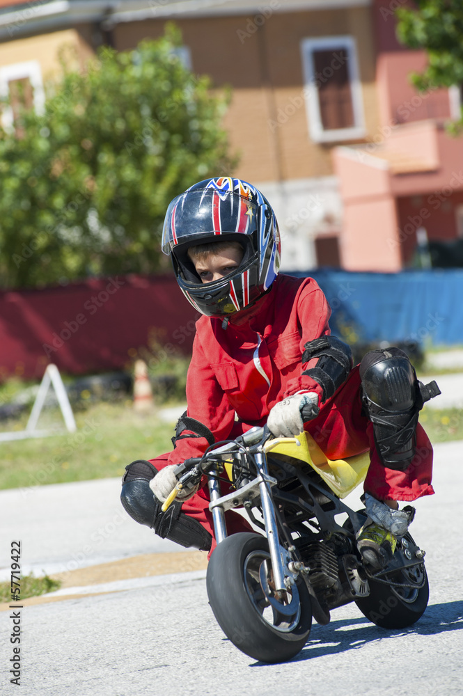 Young driver on minibike Young driver on minibike