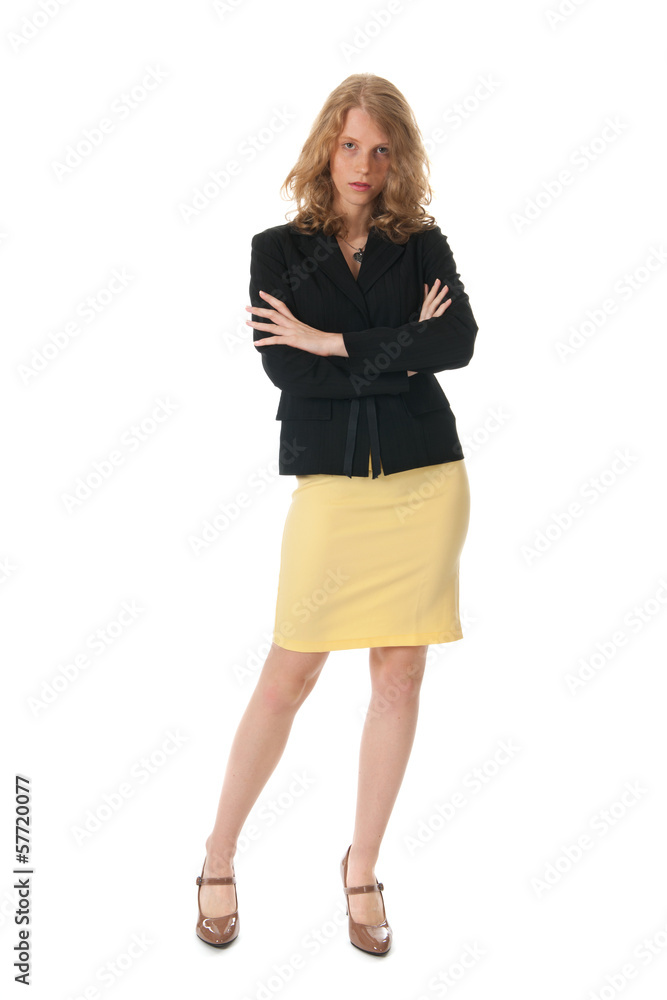Attractive business woman standing in studio Attractive business woman standing in studio