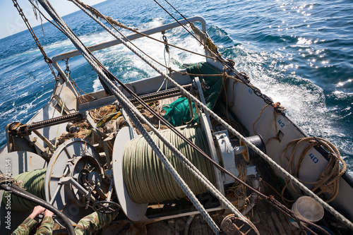 Fishing ship fishing by trawl