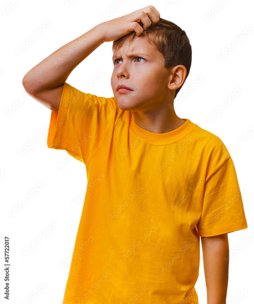 boy child teen blonde in yellow shirt scratching his head lookin boy child teen blonde in yellow shirt scratching his head lookin