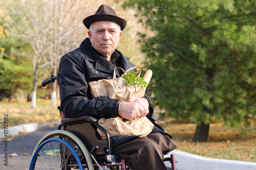 Handicapped man doing his grocery shopping