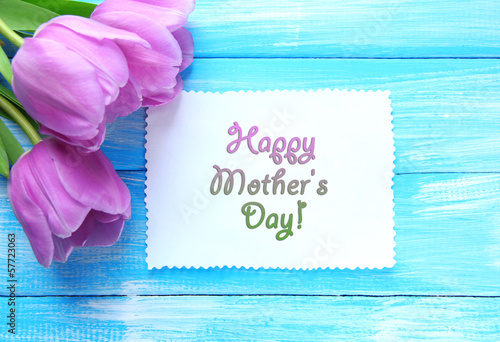 Fototapeta Naklejka Na Ścianę i Meble -  Beautiful bouquet of purple tulips and blank card