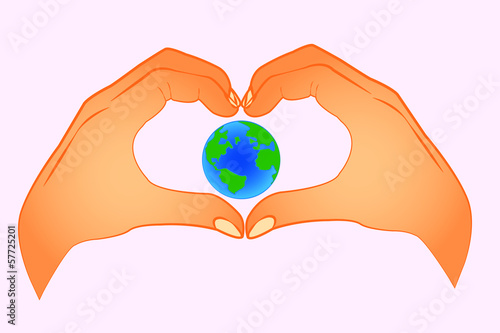 earth in hands making a heart
