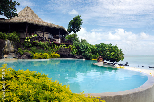 Beach bungalow in tropical pacific ocean Island.