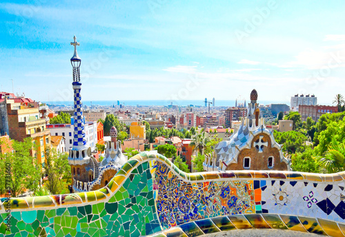 Photos The Famous Summer Park Guell over bright blue sky in Barcelona