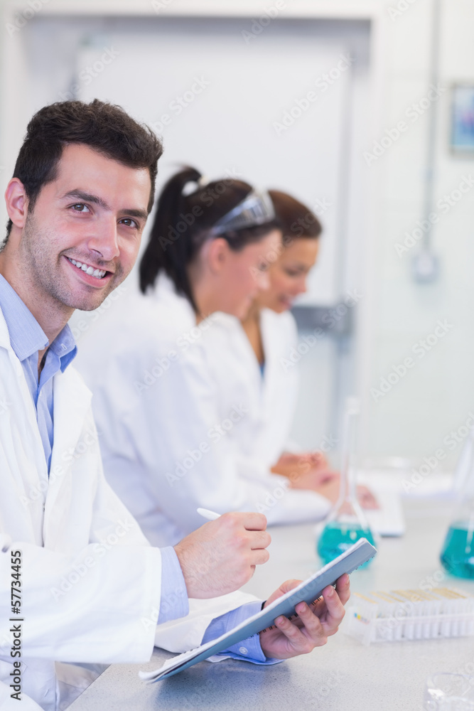 Researchers working on experiments in the laboratory Researchers working on experiments in the laboratory