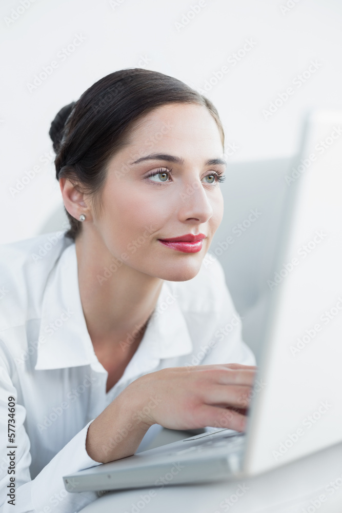 Close-up of a beautiful woman using laptop Close-up of a beautiful woman using laptop