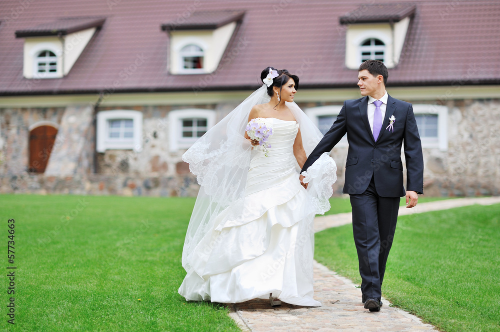 Bride and groom walking together