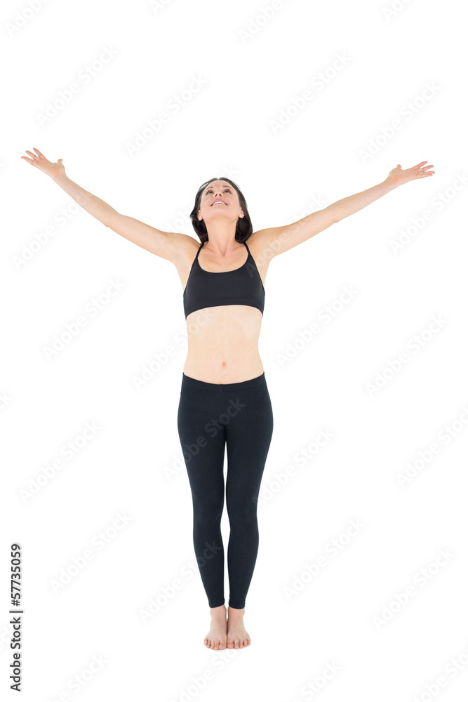 Sporty woman with hands outstretched