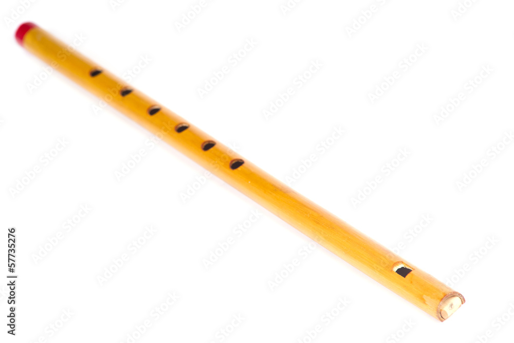 Wooden reed pipe or whistle isolated Wooden reed pipe or whistle isolated