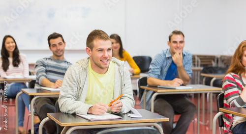 Young students smiling in classroom © WavebreakmediaMicro