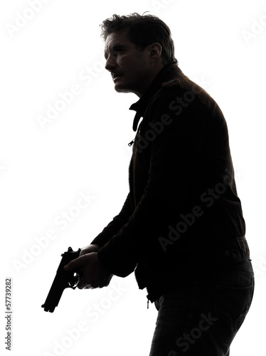man killer policeman holding gun silhouette