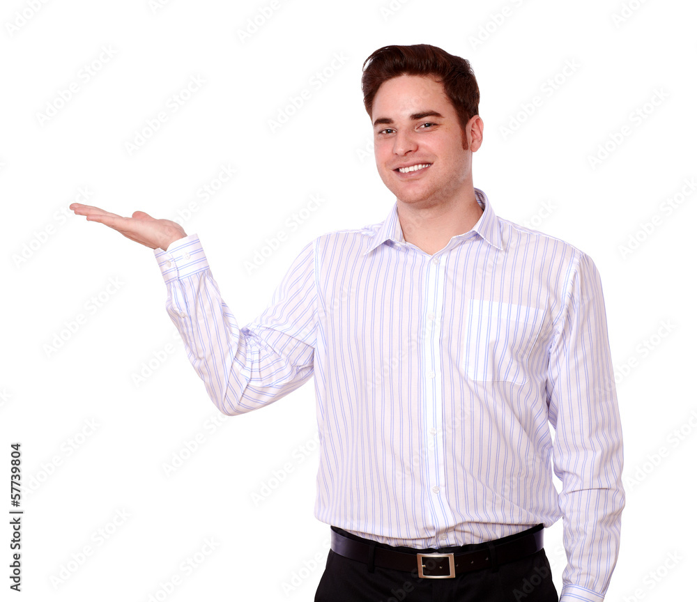 Charming redhead man holding out his hand Charming redhead man holding out his hand