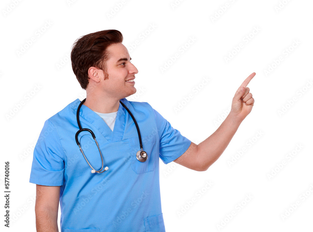 Handsome caucasian nurse pointing and looking Handsome caucasian nurse pointing and looking