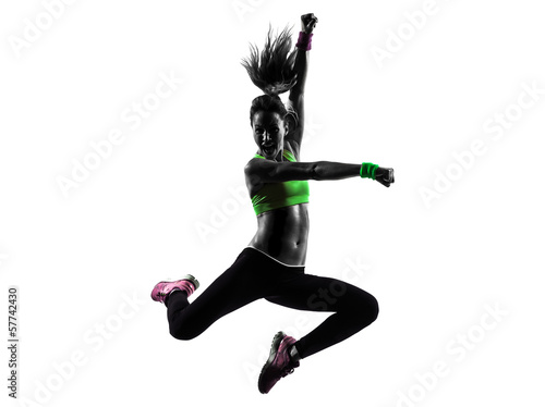 woman exercising fitness zumba dancing jumping silhouette #57742430