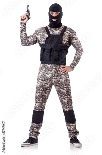 Soldier in camouflage with gun on white © Elnur