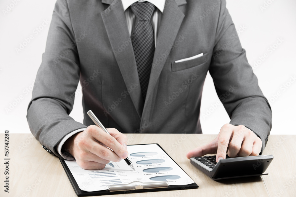 man hand with pen and business report man hand with pen and business report