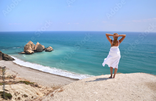 Girl looking to the sea near Aphrodite birthplace, Cyprus photo
