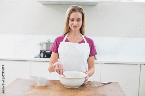 Casual happy model mixing dough