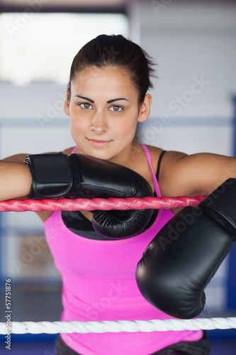 Portrait of a beautiful woman in black boxing gloves © WavebreakmediaMicro