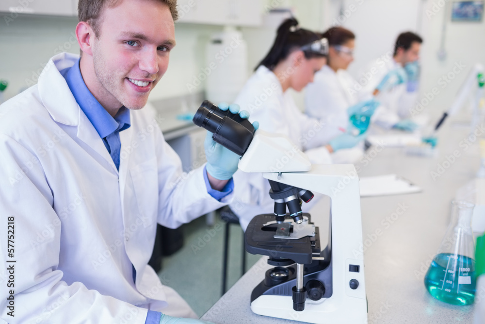 Researchers working on experiments in the lab Researchers working on experiments in the lab