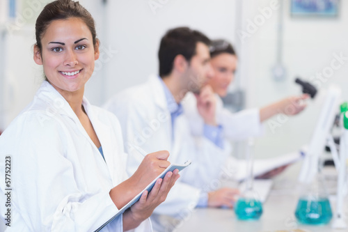 Researchers working on experiments in the laboratory