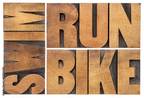 run, bike, swim - triathlon concept photo