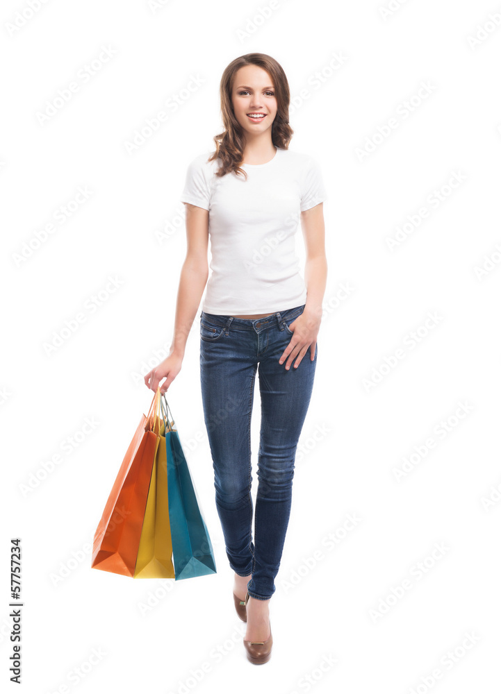 A young and attractive woman holding shopping bags A young and attractive woman holding shopping bags