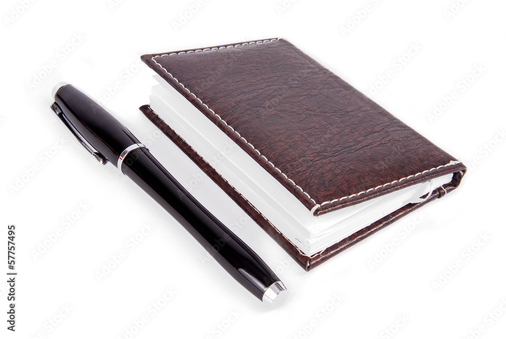 notebook and pen isolated on white notebook and pen isolated on white