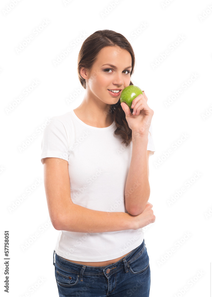 An attractive vegetarian girl holding a fresh green apple An attractive vegetarian girl holding a fresh green apple