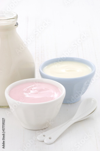 milk bottle and fresh yogurt