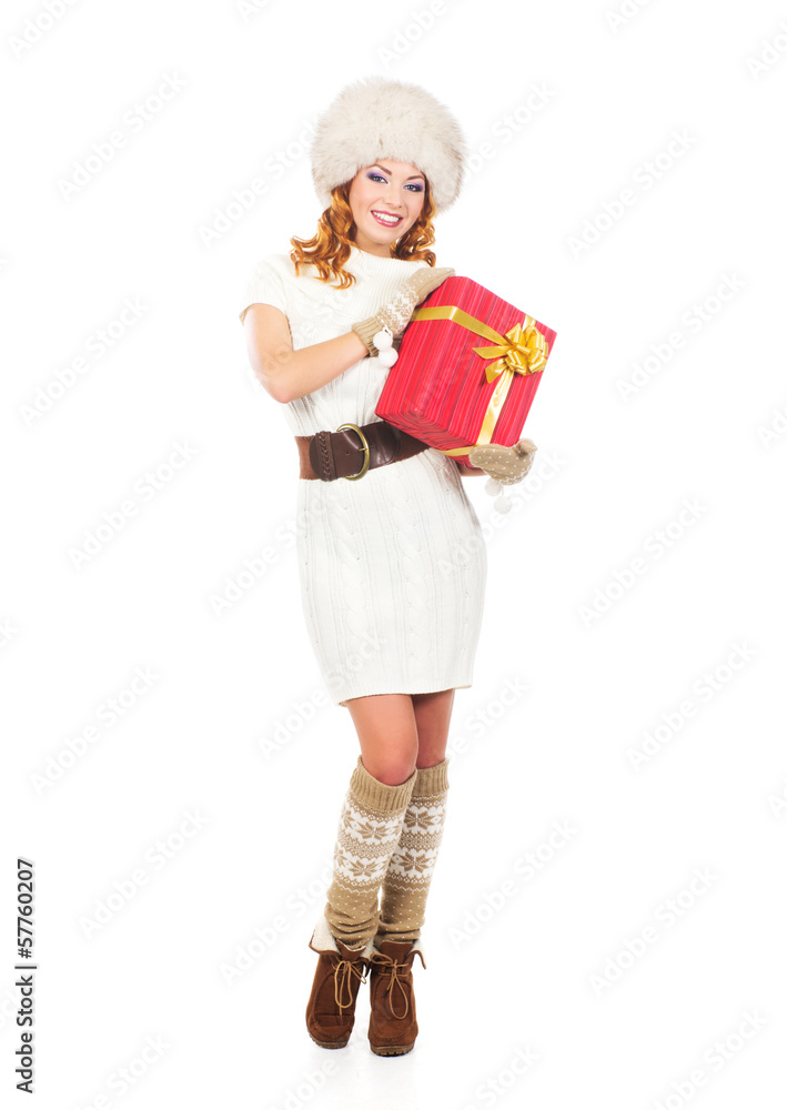 A beautiful woman with the Christmas gift isolated on white A beautiful woman with the Christmas gift isolated on white